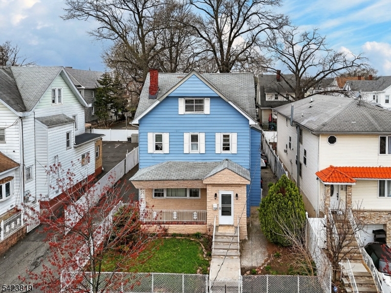 Spacious and versatile style residence offering exceptional extended living space in a prime Newark location. This well-maintained property features 5 generously sized bedrooms and 3.5 bathrooms, providing ample space to occupy. The home includes a fully finished basement with a separate walk-out entrance, ideal for an in-law suite, guest quarters, or additional living space. Property has no known issues and will be sold as it. Enjoy the convenience of private rear parking accommodating up to 6 vehicles a rare find in the area. The layout offers flexibility for owner-occupants or investors looking to maximize rental income. Perfect for commuters, this home is ideally located near multiple transportation options including NJ Transit bus lines, Newark Broad Street Station, and Newark Penn Station with direct access to NYC via train or PATH. Quick access to major highways including I-280, Garden State Parkway, and Route 21 ensures an easy commute into New York City and surrounding areas. Conveniently located near schools, shopping, parks, and local amenities, making daily living seamless. Don't miss this opportunity to own a high-potential property in one of Newark's most commuter-friendly neighborhoods.