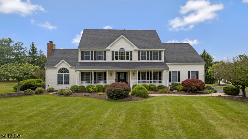 Welcome to this impeccably maintained and thoughtfully updated 4-bedroom, 2.5-bath Colonial situated on over two private acres in one of Hillsborough's most desirable neighborhoods. Offering over 3,500 square feet of living space, this exceptional home blends timeless charm with modern updates throughout.Filled with natural light, the home features spacious living and dining areas designed for both everyday living and entertaining. The updated kitchen serves as the heart of the home, featuring an upgraded center island, refrigerator drawer wine bar, abundant cabinetry, and seamless flow into the inviting family room with a gas fireplace.Recent improvements include a brand new roof, renovated hallway bath, partially updated primary bath, new second-floor hardwood flooring, custom wainscoting, and quality finishes throughout. The finished basement offers additional living space with a dedicated gym, tile flooring, and recreation area.Enjoy outdoor living on the low-maintenance Trex front porch and expansive Trex deck overlooking the private backyard. Additional features include a whole-house generator, tankless water heater, water softener, central vacuum, underground sprinkler system, natural gas piped grill, chandelier hoist, storage shed, and a 3-car attached garage.Conveniently located near parks, shopping, dining, major commuting routes, and within the highly acclaimed Hillsborough School District, this move-in ready home offers comfort, privacy, and convenience.