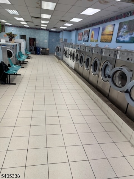 Quarter-operated launderette with a drop-off service, a clean environment, and friendly staff. Well-established business  for sale. The property is part of a strip mall condo. Prime location with high daily traffic and excellent visibility. Monthly rent including basement is $8,500. Long term lease. Tenant pays CAM.