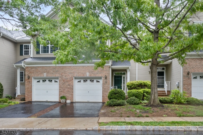 Welcome to 75 Truman Avenue, a charming and well maintained townhome nestled in the highly desirable Montgomery Hills community of Princeton. Freshly painted from top to bottom, new flooring throughout, this move-in ready gem radiates warmth and pride of ownership the moment you come in. The inviting kitchen boasts elegant granite countertops and newer sliding doors that bathe the space in natural light, creating the perfect setting for morning coffee or entertaining guests. Upstairs, two generously sized bedrooms offer the ultimate retreat, complemented by the everyday convenience of second-floor laundry. The expansive finished walk-out basement opens a world of possibilities   think home theater, playroom, home gym, or private office. All of this within the amenity-rich Montgomery Hills community, where tennis courts, tot lots, and worry-free living await. Just minutes to the charm of downtown Princeton, top-rated Montgomery Township schools, and easy access to major commuter routes   75 Truman Avenue truly has it all!