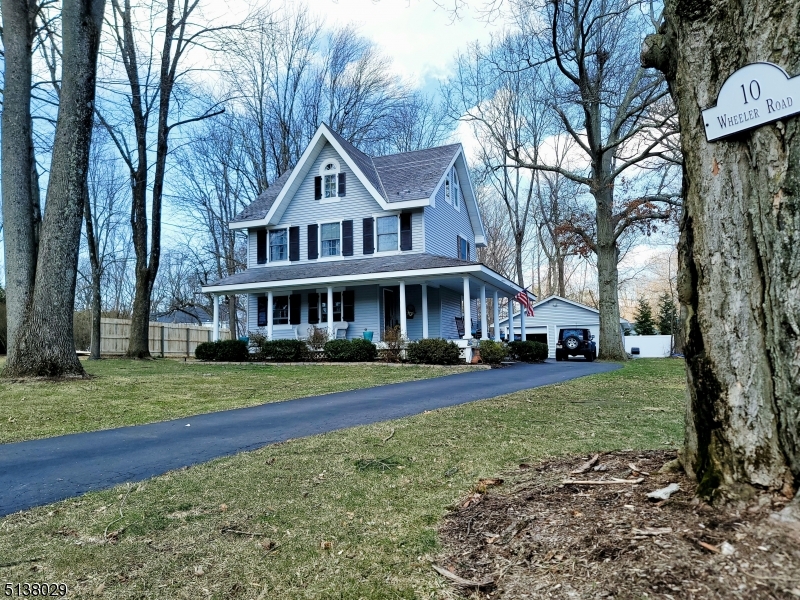 A charming Victorian located on a tree-lined street near historic Main Street, Chester. A large wrap-around porch welcomes you to this lovingly maintained home. The renovated kitchen boasts SS appliances and quartz countertops. Hardwood floors, crown molding, and custom wainscoting are found throughout. In addition to two well appointed bedrooms, the second floor office space is perfect for WFH. The third floor master suite features a custom closet space and bathroom with jetted tub. The sun-filled first floor features french-doors extending the living space to a two-tiered deck with lower patio and fire pit. Mature trees, landscaping, and a wisteria-covered pergola create a private outdoor oasis great for entertaining. An oversized 2-car garage has loft storage, while the remaining space easily provides room for a workshop and/or a home gym! The full basement provides additional storage, as well as the laundry room. A top-rated school district rounds out this picturesque, move-in ready Chester home. Highest & Best - Due Monday, 3/28 @ 8pm.