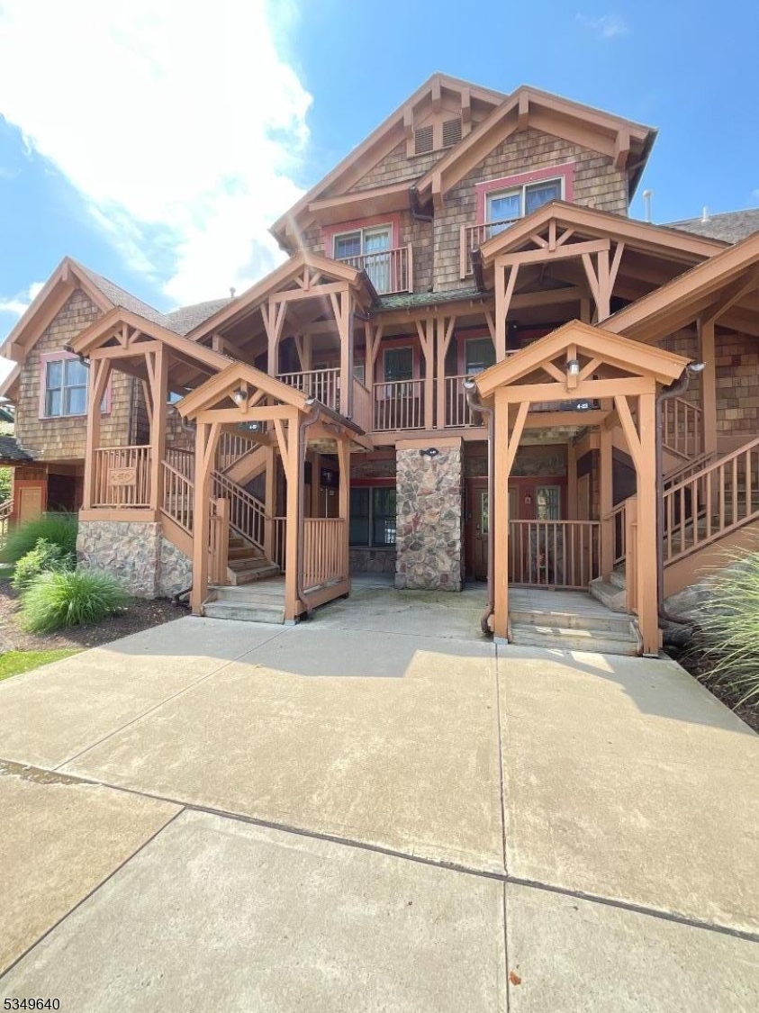 The perfect ARBNB or VRBO property.  Beautiful two story design with high ceilings and tall wall of windows for tons of light. This two-bedroom and two full bathrooms is the perfect 4 season vacation home located in Black Creek Sanctuary at the base of the Mountain Creek Resort. Turnkey property in excellent condition. You will feel right at home in the mountains w your cozy gas fireplace, modern rustic furniture, custom paint colors. The primary bedroom has king bed, plenty of closet space, private bathroom with soaking tub, stall shower and double vanity. Lots of sleeping space in extra bedroom and storage space. Private deck overlooks the mature landscaping you will have complete privacy. All appliances included w full size washer and dryer. Maintenance fee includes electric, exterior building repair, snow removal, heated pools, hot tubs, fire pit, bbq grills, landscaping, dock area, walking trail, gated entrance, trash removal, lighted parking, hard surface court and playground. Shuttle bus to the base of Mountain Creek snowboarding and skiing terrain park, world class mountain biking and water park, Crystal Springs Resort & multiple top class golf courses located within minutes. The beautiful town of Warwick has wineries, breweries, restaurants & shopping only a 15-minute drive. Purchaser is responsible for the 2% of the purchase price transfer fee to the MCA paid at closing.