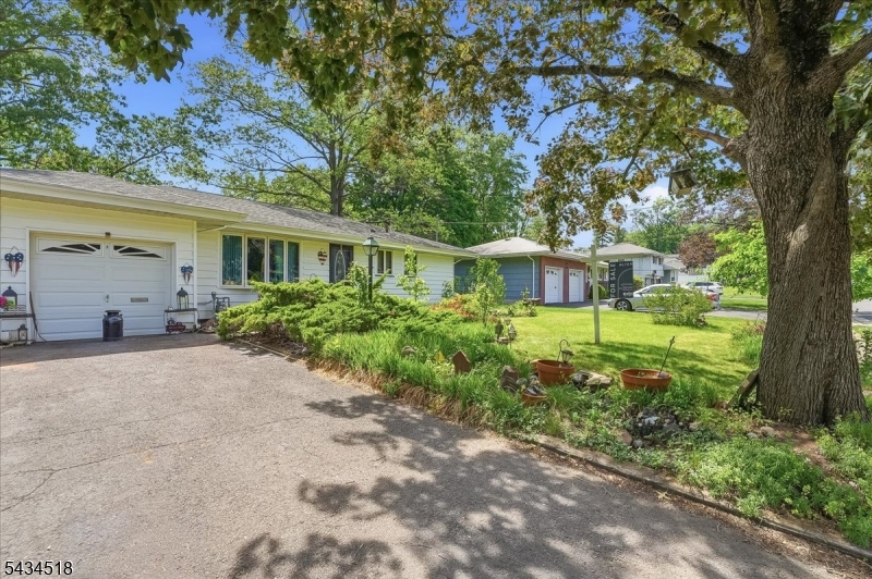 Welcome to 160 Clark, a 3-bed/ 2-bath ranch situated on a 100' x 114' corner lot (.262 acres) in one of Clark's most desirable residential neighborhoods. Offering approximately 1,146 square feet of living space, this home presents a unique opportunity for buyers seeking comfortable one-floor living with the flexibility to update, expand, or reimagine over time.The main level features a spacious living room, a large eat-in kitchen, three bedrooms, and a full bath. A partially finished basement adds valuable bonus space and includes a second full bath, offering flexibility for recreation, hobbies, a home office, gym, or additional storage space. Central air conditioning, an attached one-car garage, and a 2+ car driveway provide everyday comfort and convenience.Outside, enjoy a level backyard with a deck, fenced yard, and plenty of room for outdoor entertaining, recreation, gardening. The property's corner location and .262-acre lot create opportunities for buyers looking to personalize the existing home while also appealing to those exploring expansion or redevelopment possibilities, subject to municipal approvals.Conveniently located near parks, shopping, dining, schools, and major transportation routes, this property offers exceptional potential in a community where renovated and newly constructed homes continue to attract strong buyer interest. Whether you're searching for a home to make your own or a renovation project, 160 Clark Avenue is ready for its next chapter.