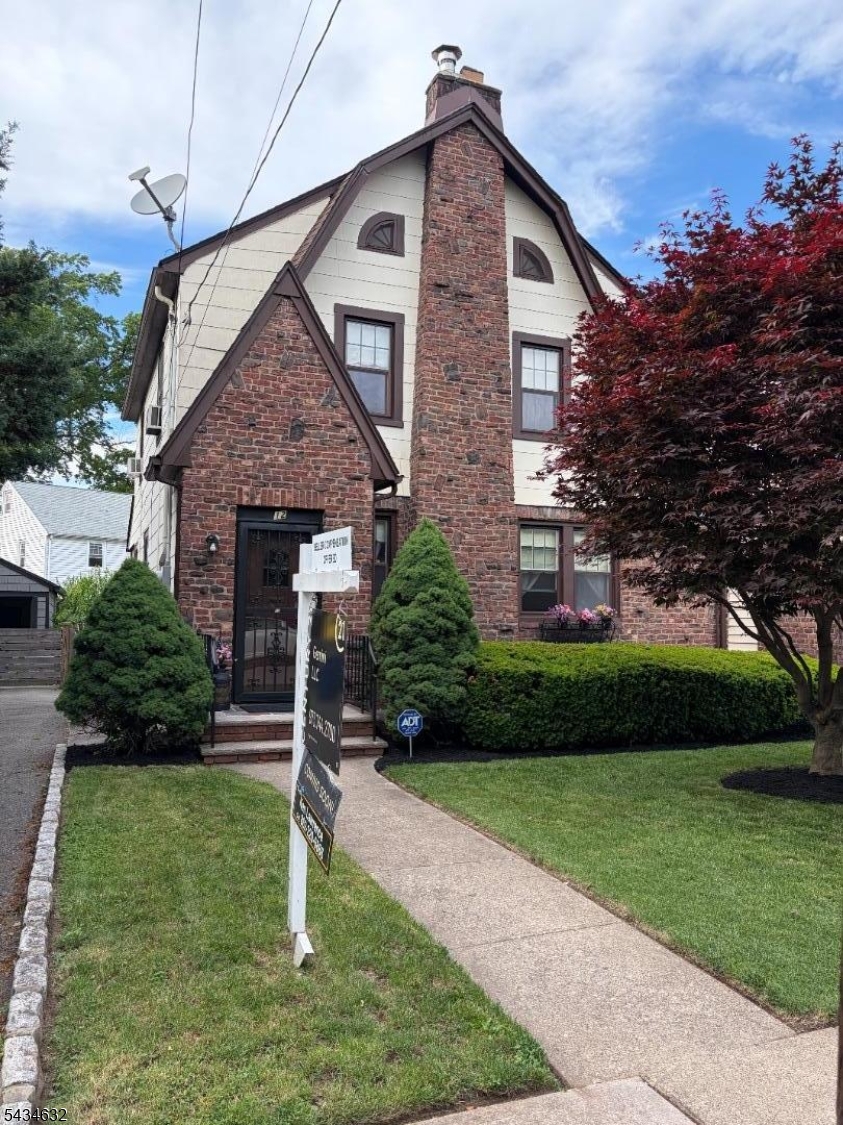 Location Location - Welcome to this very desirable Oakview Section of Bloomfield that is also located on a sought after Street. Must See Charming & Well Maintained 3 Bedroom Tudor style Sun Filled home just a half block from NYC Bus - very close to GSP/RT3/RT46/other Highways,Shopping,Restaurants, & Large Brookdale Park. Completely Move-In Condition with no known issues (any upgrades can wait if needed). Welcoming vestibule w/Cedar Lined Coat Closet. Large Living Room w/working Wood Burning Fireplace (Newer Chimney Liner) & Parquet Ribbon Floor. Hardwood Floors throughout & Chestnut Wood Trim throughout. Formal Dining Room, EIK, Pantry off Kitchen(can be made into a 1/2 bath), Large Kitchen w/Retro Tile & all Newer Appliances, Heated Bonus Room off DR perfect for Office or Playroom. Partially Finished Walkout Basement with Newer Washer/Dryer & a toilet (toilet can be made into 1/2 or Full Bath),Newer Water Heater,Newer Sump Pump w/Battery Backup,Upgraded 100Amp Circut Breaker Electric Panel,Newer Double-Lined Oil Tank. 3 Spacious Sun Filled Bedrooms. Large Full Bathroom with Original/Retro Tile, Soaking Tub, Arched Stall Shower, Newer Sink/Cabinet/Faucet/Lighting. Included are 4 Working Window Air Conditioners. Large Walk-up Attic w/Electric is waiting to be made a 4th Bedroom. Long Belgium Block lined Driveway can hold 3 Cars. Nice Level & Fenced Lot w/Cement Patio for Outdoor Dining/Entertainment & Storage Shed w/Cement Floor.You will be Proud to call this house your Home.
