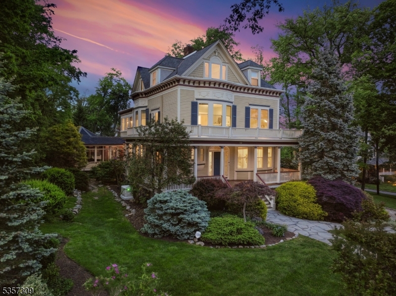 Spectacular 7 bed, 3.2 bath home (with two additional work-from-home offices) set on a professionally manicured one acre level property on the most beautiful block in the Wyoming Estates section of Millburn.  Updated in 2022 with gorgeous original detailing throughout, this home seamlessly integrates classic charm with modern living.  Bright, spacious interiors with oversized windows & high ceilings.  Gourmet, eat-in kitchen with marble tile backsplash and quartz countertops, and stainless steel appliances. Retreat to your own primary suite with a spa-like bath with soaking tub, stall shower, & radiant-heated floor.  Multiple office spaces provide options for work-from-home.  An entertainer's dream with easy indoor/outdoor access, an incredible custom mahogany gazebo, an expansive deck, and professionally landscaped, private grounds. Recent upgrades include a new roof with a 50-year warranty (2025), whole house Generac Generator (2024), hookup for EV charger, renovated hall bath (2022), whole home monitoring system, and more! A quick stroll to the Midtown Direct Train in Maplewood, Wyoming Elementary School, and South Mountain Reservation. This home is NOT zoned historic.