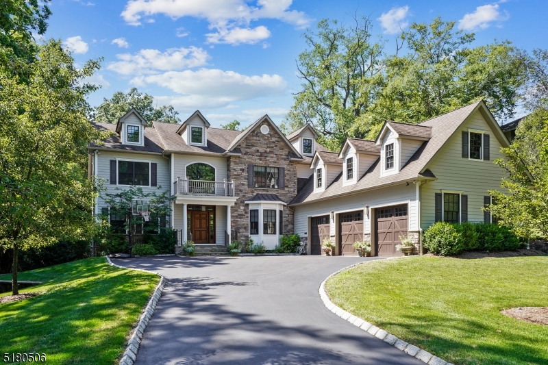 Your Dream Home! Spectacular Center Hall Colonial built in 2012 by award winning Millennium Custom Homes with stunning new saltwater pool, spa & summer kitchen on totally level .77 acre south facing lot with great privacy surrounded by mature landscaping in desirable Hartshorn Elementary School district. Grand 2-story entrance hall, high ceilings, banquet sized dining room, butlers pantry, sun-soaked Chefs gourmet eat-in kitchen with custom white cabinetry, center island, and best of the best Professional appliances, Subzero refrigerator, Pot Filler over Wolf 6 burner range, double ovens and Miele dishwasher, totally open to family room with gas fireplace & coffered ceiling with surround sound. 1st floor also features a great home office, convenient laundry, incredible in-law suite with en suite bath and easy access to 3-car finished attached garage. Primary Suite has a tray ceiling & 2 custom walk-in closets, Spa-like Primary bath with soaking tub & shower, 4 additional bedrooms - all of generous proportion that share 2 full baths complete the 2nd floor. Beautifully finished lower level with media room, exercise room, recreation room & nanny's suite. Other features include high end security, 300 Amp Service & Generator. Bus service to Hartshorn Elementary, Middle School and High School. This Short Hills beauty with an idyllic pool, spa & summer kitchen is a must see!