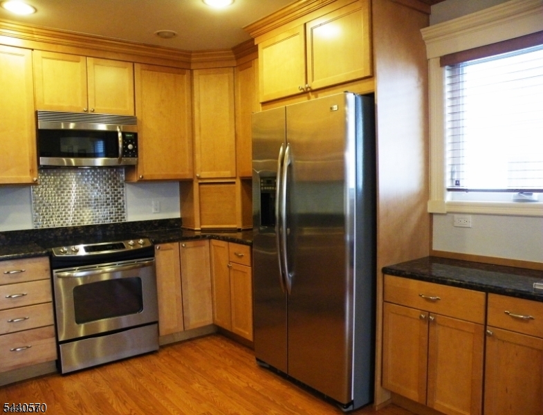Spacious & Updated Apartment in the Heart of Westfield Welcome home to this bright and spacious second-floor apartment ideally located in the heart of Westfield. Featuring an updated kitchen with modern finishes, renovated bathrooms, and an open, comfortable layout, this home offers both style and convenience. Enjoy the ease of in-unit laundry hookups, abundant closet space, and additional storage throughout. Dedicated parking adds to the convenience of everyday living. Just moments from downtown Westfield's vibrant shops, restaurants, and NJ Transit train service, this prime location makes commuting and enjoying all that Westfield has to offer effortless.
