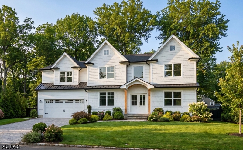 Situated in the highly sought-after Parkwood section of Scotch Plains, this brand-new custom home by Little Bear Builders offers exceptional craftsmanship, thoughtful design, &  luxury across three finished levels. Featuring 6 bedrooms & 6.5 baths, this residence is perfectly tailored for both everyday living and elegant entertaining. The main level showcases a seamless, open-concept layout w/ an effortless flow between the living room, dining room & expansive family room. At the heart of the home is a stunning chef's kitchen, complete with an oversized island, premium appliances, quartz countertops,  a butler's pantry, all opening directly to the family room with a gas fireplace. A walk-in pantry and a spacious first-floor bedroom add both convenience and flexibility. Upstairs, the second level offers four generously sized bedrooms all complete with walk in closets. Three bedrooms feature en-suite baths, while an additional bedroom is serviced by a well-appointed hall bath. The luxurious primary suite is a true retreat, highlighted by vaulted ceilings, dual walk-in closets, & a spa-like bath with a double vanity & soaking tub. The fully finished lower level impresses w/ 9-foot ceilings, an expansive recreation area, an additional bedroom, & a full bath. Set on a flat, professionally manicured property, the outdoor space includes an expansive paver patio, underground sprinklers, & a full-house generator, completing this exceptional residence. Completion date July 2026.