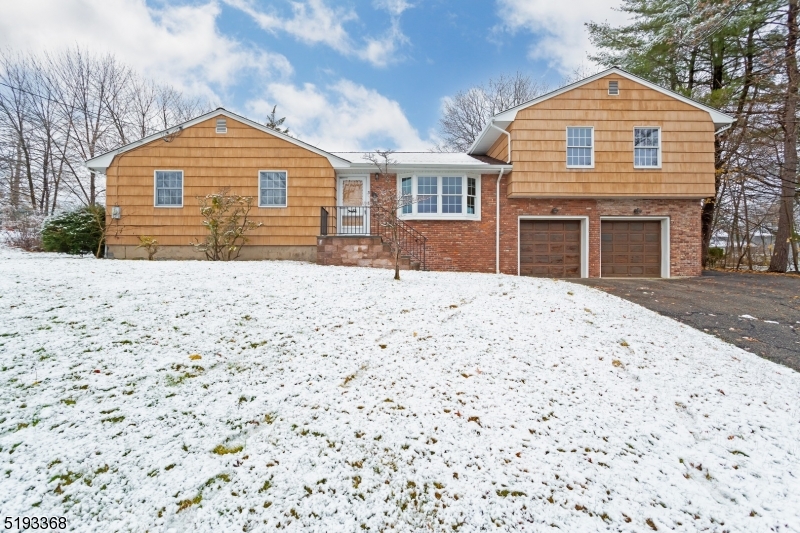 Lake Intervale!!! Step into this ranch with hardwood floors on main level, freshly painted, and addition of a primary bedroom with a large fully renovated Master Bath! Walk in closet and new carpeting. As you walk into the kitchen you can see the family room with inviting gas fireplace for the upcoming cold nights. Living Room with freshly refinished floors and separate dining room for entertaining. There are 3 bedrooms on the main level and brand new fully renovated full bathroom. As you meander downstairs to the basement, all that is left to do is pick your own flooring! Customize it to your liking.  Also there is an entrance to the garage. Lake Intervale is such a memory area, plenty to do with a beach, tennis courts, beach pavilion and playground  and all around fun! Close to Mountain Lakes train station, and bus.  Close to shopping and highways and transportation! Optional beach fees for full use of lake. What a community!!!!!
