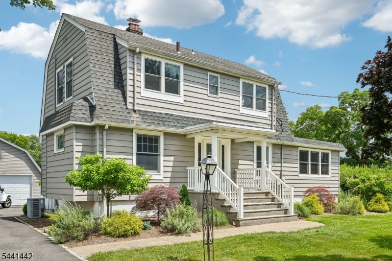 Welcome to this beautifully maintained Colonial situated on an expansive property in one of Fairfield's most desirable neighborhoods. Boasting outstanding curb appeal and a bright, inviting interior, this home offers a spacious floor plan enhanced by gleaming hardwood floors, abundant natural light, and tasteful modern finishes throughout. The main level features a generous Living Room with a decorative stone fireplace, a formal Dining Room, and an updated Kitchen with white cabinetry, granite countertops, stainless steel appliances, and ample workspace for everyday living and entertaining. A convenient Powder Room and oversized Laundry Room with plenty of storage complete the first floor. Master Bedroom offers a walk-in closet and Master Bath, while the second floor includes three additional Bedrooms and an updated full Bath. The fully finished Basement provides versatile living space ideal for a Family Room, Recreation Area, Home Office, Gym, or Playroom. Recent improvements include a newer roof, Anderson tilt-in windows, doors, driveway, and backyard paver patio, along with heating and central air systems that are approximately four years old. Additional highlights include a detached 2 car Garage and a spacious backyard perfect for relaxing or entertaining. Located near Fairfield's renowned recreation complex, shopping, dining, major roadways, and NYC transportation, this move-in-ready home combines space, comfort, and convenience in an exceptional location.