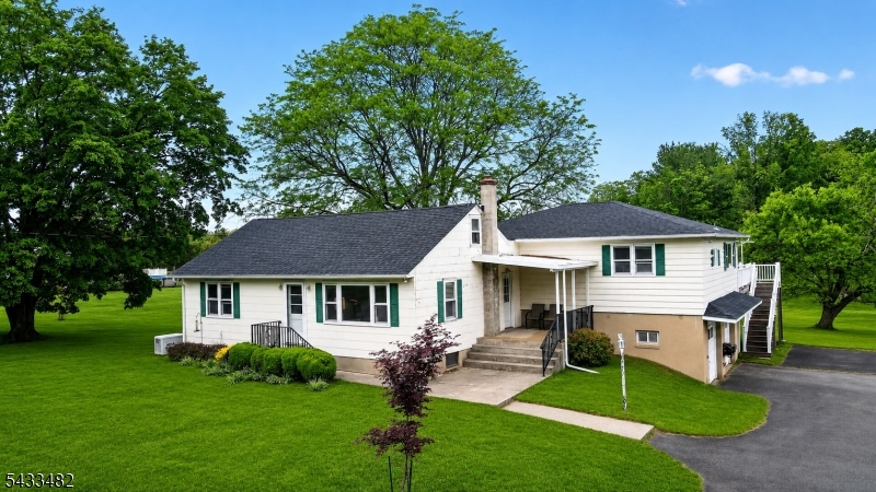 Opportunity awaits on 3.2 scenic acres in sought-after Readington Township. This property is ideal for investors, contractors, flippers, or buyers looking to renovate and build equity in a beautiful country setting.The home offers solid bones and key updates including a newer roof, newer furnace, and a Generac generator already in place, while the interior is ready for cosmetic updating and vision. Features include granite kitchen countertops, well water, septic, and a spacious lot with endless potential for expansion, outdoor living, gardens, hobby farming, or creating your dream retreat. Bring your imagination and transform this property into something truly special. Conveniently located near major commuting routes, shopping, and the charm of Hunterdon County.Property being sold strictly AS-IS.