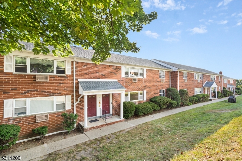 Move-in ready, ground-floor 2-bedroom condo in the sought-after Mountain Club community! This unit boasts an updated kitchen with NEW stainless steel appliances and a large walk-in pantry. The bathroom has been updated with a modern vanity and a tiled shower/tub combo. Beautifully refinished hardwood floors run throughout the home, and A/C units are installed in the living room and bedrooms for added comfort. An assigned garage parking spot is available for just $40 per month. The remodeled clubhouse offers amenities like a gym, sauna, pool, and tennis courts. Low monthly fees cover sewer, water, heat, gas, trash, snow removal, exterior maintenance, and access to all amenities. Additional perks include a designated parking spot behind the building, secure storage in the basement, and coin-operated laundry facilities. Ideally located for commuters, with easy access to NYC trains, highways (Route 10, 287, 80), shopping (less than a 1 mile), and variety of restaurants . Quick closing available!