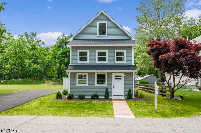 ATTENTION INVESTORS: TENANT IN PLACE & BEING SOLD AS A RENTAL PROPERTY!!! Fully reimagined in 2024, this stunning 3-bedroom colonial is essentially brand new everything has been updated except for the four walls! Currently leased to a quality tenant, with an owner-reported rental income of $55,200, taxes of $9,872.02, and insurance costs of $3,773.25, resulting in a net operating income of $41,555. Virtually no repairs or replacements are anticipated in the near future, making this an ideal investment for a hands-off landlord. Inside, the home boasts 3.5 elegantly designed baths, including a luxurious primary suite that spans the third floor. The thoughtfully redesigned floor plan offers a modern, functional layout.Outside, the property sits on a spacious open lot with a peaceful stocked trout stream running through the backyard a serene retreat that the owner represents has not been affected by flooding. The location couldn't be more convenient: just minutes from major highways and even closer to the train station, all in the highly sought-after Peapack-Gladstone area. This property is being offered as a rental investment with a tenant already in place.