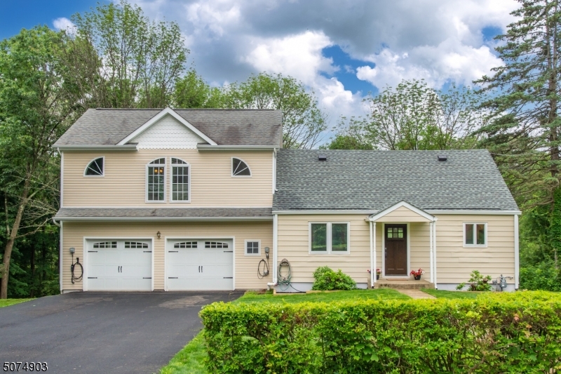 Updated custom colonial on just under an acre in one of the best school districts in NJ! This home has been modernized with a new granite kitchen with stainless steel appliances, recessed lighting and breakfast bar w/ pendant lights. First floor features heavyweight EVP flooring and Andersen 400 windows have been added throughout, as well as new French doors and front door.  Gas ventless fireplace, upgraded electrical, plumbing, insulation added to exterior walls, 5 zone heatpump cooling and heating allows for most rooms to be individually temperature controlled, 8.15kW owned solar electric system, natural gas connection, three 11kW electric vehicle charging outlets, new asphalt driveway, freshly painted. Plenty of storage in tall attic, bsmt and oversized garage. Very close to Randolph Trails & Brundage Park.