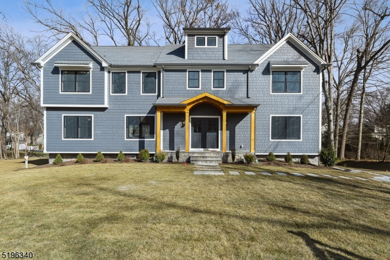 Brand new dream home!! Premier designer and builder, JTS, brings another incredible home to market on a highly sought-after street. A wide, level lot with mature trees is the perfect setting for this 6 BR, 5 Full Bath, 2 Half Bath home. Warm, upscale finishes- custom millwork, white oak flooring, designer light fixtures, are only a few of the special touches that make this new build feel like a high-end custom home. Large open-concept first floor layout with first floor en-suite bedroom, dedicated office, walk-in pantry and 9' ceilings. Second floor is home to a beautiful laundry room and 5 large BRs (includes primary suite) all with unique millwork and custom closets. An enviable primary suite boasts spa-like bath with heated floor, vaulted ceiling with oak beams and shiplap. Finished 3rd floor has a closet and is open for a bedroom or whatever someone wants to create. Walk out basement with half bath, custom mudroom and large recreation area. Some of the most impressive features of amazing home don't necessarily stand out to the naked eye ... Spray foam insulation, full house generator, Hardie composite shake and plank, Thermador appliance package, humidifiers on HVAC units, wired for sound, bluetooth speakers in 2nd fl bathrooms, multi-zone sprinkler system, Belgium block lined driveway, composite decking