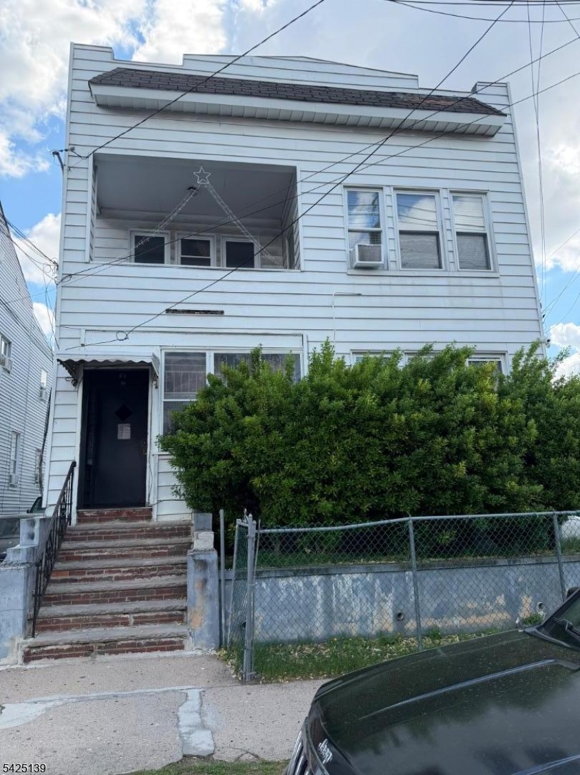 Large 4 family house. Great opportunity for investors or owner occupants! Each unit features a similar layout with living room, eat-in kitchen, 2 bedrooms and 1 bath. Basement is partially finished. Separate utilities, 3 newer furnaces and 3 newer hot water heaters. 2 car garage and driveway with 4 parking spaces. Conveniently close to transportation, shopping and parks.