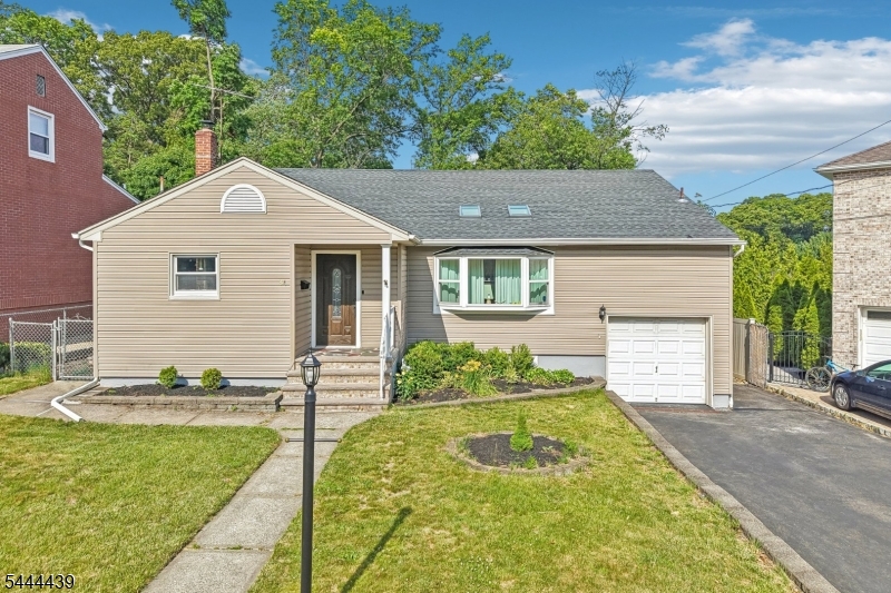 Welcome to 84 Howard Place, a beautifully updated 3-bedroom, 3-full-bath backsplit home set on one of Nutley's most desirable streets. Perfectly positioned in Nutley, this home offers the space, location, and lifestyle buyers have been waiting for. Step inside to a spacious living room with soaring ceilings that perfectly complement the beautiful stone wall, creating a warm and impressive first impression. The living and dining rooms flow into the updated kitchen, giving the home an inviting open-concept feel. The kitchen features gorgeous stainless steel appliances, modern finishes, and a layout ideal for everyday living and entertaining. Upstairs, you'll find three comfortable bedrooms, including a primary suite with a stunning ensuite bath complete with a floating tub and shower. An updated hallway bath serves the additional two spacious bedrooms. The lower level expands the home even further with a family room, sitting area, office, access to the attached garage, a full bathroom, and multiple access points to the backyard. The basement offers even more flexibility with an additional office/den, large laundry area, utility room, and excellent storage. Outside, enjoy a large multi-level backyard with a patio, covered sitting area, and grill space. With beautifully finished hardwood flooring through the upper 2 levels, newer roof, 2-zone central air, an attached garage, attic storage, generous closets, and multiple bonus spaces, this Nutley home truly has it all!