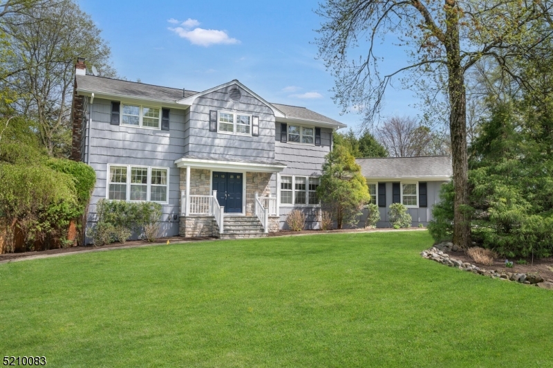 Fantastic colonial in the perfect location - minutes to Convent or Morristown Train Stations, convenient to Morristown square, shopping malls, restaurants and more!  Updated center island eat-in kitchen features white cabinetry, marble countertops, stainless appliances and new flooring, backsplash and bay window for additional natural light.  First floor also offers powder room, formal dining room, living room with wood burning fireplace, spacious family room and adjacent bonus room.  Second floor features 4 spacious bedrooms, laundry room, updated main bath, primary suite with large double closet and bath with jetted shower, granite double vanity, vaulted ceilings and more!  Other highlights include entertainment sized deck with hot tub and awning, patio, fully fenced yard, paved driveway with Belgian block curbing, remote controlled thermostats, alarm system, all appliances included, finished walk-out basement with full bath, oak, bamboo and luxury vinyl flooring throughout, large level yard.