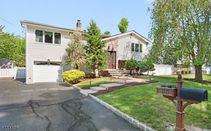 Absolutely stunning 4-bedroom, 2.5-bathroom Bi-Level home located at 110 Bell Avenue in the heart of Hopatcong. This beautifully maintained home offers the perfect blend of comfort, style, and modern upgrades. The main level features a bright formal living room, elegant crown moulding, and recessed lighting throughout. The updated eat-in kitchen showcases granite countertops, stainless steel appliances, decorative tiled backsplash, custom-built cabinetry, and a separate dining area perfect for entertaining. The inviting family room offers sliding door access to the backyard, creating seamless indoor-outdoor living. Upstairs features 4 generously sized bedrooms, including a spacious primary bedroom with ample closet space and its own private bathroom. An additional full hallway bathroom includes a relaxing jacuzzi tub. Step outside to enjoy the fully vinyl-fenced backyard complete with an above-ground pool, paved patio, and beautifully landscaped exterior ideal for gatherings and summer enjoyment. Additional highlights include Anderson & Marvin windows and doors, central air conditioning, and upgraded finishes throughout. Conveniently located near shopping, dining, schools, parks, commuter routes, and lake activities, this move-in-ready home is a true gem in desirable Hopatcong.