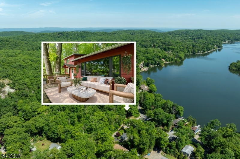 Highland Hideaway located across from Highland Lake Main Lake near the kayak launch and community boat slips offering classic Highland Lakes charm in a highly convenient lake-community setting. This 3-bedroom, 2-bath home sits on a nearly quarter-acre lot with a private wooded backyard, generous deck space, and a peaceful natural backdrop. Inside, warm original wood finishes, vaulted ceilings, exposed beams, and large windows create an inviting cabin-inspired feel. The main living area is anchored by a striking stone fireplace, while adjoining dining and sitting spaces offer flexibility for gathering, relaxing, or enjoying views of the surrounding trees. The kitchen continues the home's rustic character with wood cabinetry, a breakfast bar, and an easy connection to the living areas. A large bonus room adds flexibility for dining, lounging, work-from-home use, or guest overflow. Outdoor living is a highlight, with multiple deck areas for dining, entertaining, or unwinding after a day at the lake. A new septic system will be delivered upon closing, or an equivalent credit will be provided with complete design and installation quotes. Enjoy private access to Highland Lakes Country Club's five lakes and seven sandy beaches, plus year-round recreation including swimming, sailing, fishing, hiking, racquet sports, arts, music, play groups, and community events. With Mountain Creek nearby for winter fun, this is an appealing four-season lake home.