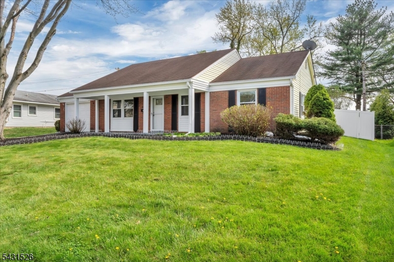 Welcome to 17 Topeka Pass in Willingboro's highly desirable Twin Hills neighborhood. This stunning Farmingdale rancher offers nearly 1,900 sq. ft. of comfortable living space and has been thoughtfully updated while maintaining the charm that makes these models so popular. Step onto the inviting front porch and into a beautifully maintained home featuring four bedrooms and three full bathrooms. The heart of the home includes a renovated kitchen (2021) with granite countertops, ceramic tile flooring, soft-close cabinetry, stainless steel appliances, and recessed lighting, all complemented by newer windows throughout. A standout feature is the expanded fourth bedroom addition, complete with vaulted ceilings, two skylights, ceiling fan, recessed lighting, vinyl plank flooring, and a full private bath. With its separate exterior entrance and interior access, plus its own dedicated HVAC zone, this space is ideal as an in-law suite, guest retreat, or private home office. Additional highlights include two-zone HVAC, Generac whole-house generator, security system, gutter guards, and a mudroom with washer and dryer just off the garage. The one-car garage and large storage shed provide plenty of space for tools and equipment. Outside, enjoy a beautiful vinyl privacy-fenced backyard oasis set on nearly a quarter-acre lot, complete with a concrete patio perfect for relaxing or entertaining. ***MOTIVATED SELLER***