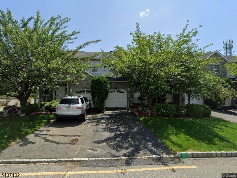 Beautiful NORTHEAST-FACING townhome located in the highly desirable Glenmont Commons community. This well-maintained residence offers a spacious and functional layout featuring 2 bedrooms, 2 full baths, and 2 half baths, designed for comfortable everyday living.The main level showcases a bright and inviting living space with a cozy GAS FIREPLACE, modern lighting, and an elegant flow ideal for both relaxing and entertaining. The updated kitchen features GRANITE COUNTERTOPS (2025), NEW DISHWASHER (2025), and a GAS RANGE (2024), combining style and functionality.The upper level offers generously sized bedrooms with ample closet space and well-appointed bathrooms. A FULLY FINISHED WALKOUT BASEMENT provides exceptional additional living space and includes a HALF BATH, PRIVATE ENTRANCE, and a dedicated OFFICE AREA with CARPET flooring, making it ideal for working from home. Recent upgrades include NEW WOOD FLOORING (2025) throughout the main living areas, NEW WATER HEATER (2025), WASHER (2023), NEW CHANDELIER, updated lighting, and a CENTRAL VACUUM SYSTEM for added convenienceOne of the home's most desirable features is its exceptional backyard setting. The rear of the home offers COMPLETE VISUAL PRIVACY with expansive, unobstructed views, creating a peaceful outdoor retreat rarely found in townhome living. Ideally situated close to major highways, this home offers the perfect combination of modern updates, functional living space, privacy, and prime location.PHOTOS COMING SOON!