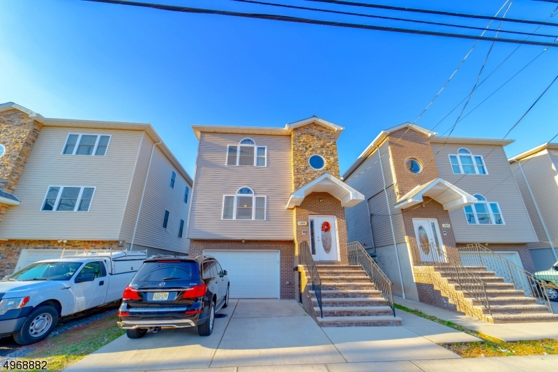 You do not want to miss out on this amazing new construction multi unit home! This home has 3 enormous bedrooms and 2 full bathrooms on each floor, comes fully equipped with oven, stove, dishwasher and microwave in each unit! No work needed, move in ready!! In great locale with amazing homes surrounding it and close to public transportation, shops, and schools! THIS PROPERTY IS A MUST SEE VIRTUAL TOUR AVAILABLE