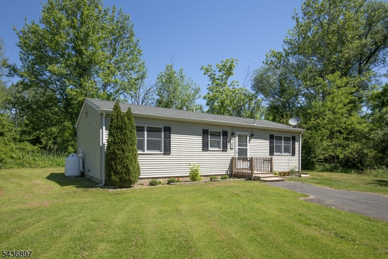 Charming newly renovated two bedroom, one bath cottage with open floor plan and A/C.  Oversized living/dining room with large closet and lots of light, sliding glass door to backyard and open to updated kitchen with gas stove, refrigerator and dishwasher.  Renovated full bathroom with tub/shower, utility closet and full size washer and dryer.  Tucked  back off Highway 22 with open yard and large storage shed in rear.   Close to Round Valley reservoir and walking trails. and convenient to I-78 and train station. Landlord maintains lawn and pays for trash removal.  Tenant  must have renter's insurance and is responsible for snow removal on front walkway.