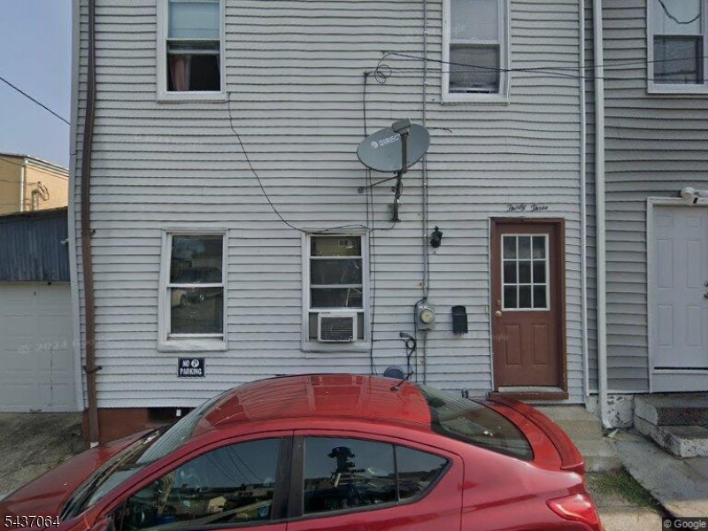 Welcome to this charming 3-bedroom, 1 full bath End Unit Townhouse! This well maintained property offers a spacious eat-in kitchen, first floor washer and dryer hookup, along with a beautifully tiled full bathroom. Enjoy outdoor living with a fully fenced-in yard, ideal for pets, gardening, or relaxing in your own private space. The home also features an updated boiler and water heater, providing peace of mind and added efficiency. Easy walk to downtown shops and dining. Pets Negotiable. Must See!