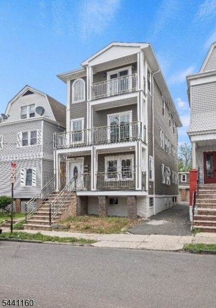 Located in Upper Irvington on the Maplewood line, this multi-family home has been thoroughly updated and is in move in condition. Hardie-board siding and new windows grace the exterior, with balconies off the second and third levels. Among the many updates are new gas boilers and chimney liner, new plumbing and electric, new kitchens and baths, new flooring and doors, and the entire home has been repainted. Both first, second and third floors feature Living Room, Kitchen, 3 bedrooms and Full Bathroom. Full finished basement with high ceilings full bath, kitchen and 2 bed rooms. Detached garages, Parking in rear for two cars as well. Turn key opportunity for either an owner to live in one unit and have income to assist in housing cost, or for an investor looking for high cash flow potential.