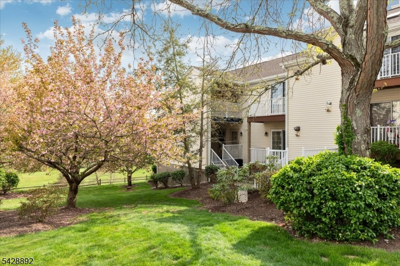 Welcome to the highly desirable Spring Ridge community in Basking Ridge, known for its top-rated school district. This beautifully updated Ardsley model offers ground-level living, a rare in-unit storage room, and a spacious walk-out patio in Madison Village. This stylish home features an open-floor plan filled with natural light, connecting the living and dining areas. The remodeled kitchen showcases modern finishes, quartz countertops, tile flooring, a peninsula breakfast bar, perfect for everyday living and entertaining. The updated bathroom provides a spa-like retreat with quartz counters and elegant tilework. The spacious bedroom includes a large closet and direct access to the bath for added convenience. Enjoy an in-unit washer and dryer, assigned parking, and ample guest parking. Gain added peace of mind with a one-year home warranty included. Step outside to your private patio and enjoy serene views of lush greenery. Residents enjoy a community manager, playground, tennis courts, clubhouse, walking/bike paths, inground pool, and bocce courts. This beautifully maintained 326-acre community borders 100+ acres of preserved natural land, creating a peaceful wooded setting. Conveniently located near shopping, dining, medical facilities, major highways, and NYC transportation, with nearby recreation including the Somerset Hills YMCA, Bridgewater JCC, and Somerset County parks such as Lord Stirling Park, Colonial Park, Washington Valley Park, and Sourland Mountain Preserve.