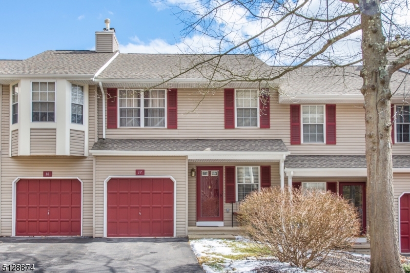 Immaculate townhome, neutral decor and gorgeous golf course views!  One step in, onto the main living floor with hardwood flooring, garage access, powder room, white kitchen with stainless appliances, large dining room and living room with woodburning fireplace, sliders to balcony overlooking the golf course!  Finished basement is daylight and walk-out and features a gas fireplace and track lighting.  On the 2nd floor there is laundry and 2 very spacious bedrooms, each with its own full bath and walk-in closet.  Country club style amenities include outdoor pool, tennis courts and public executive golf course.  Easy commute to Rt. 31.1 Dog, 1 Cat limit (not two of either); 2 separate associations: condo association is $375/month + master association (Fairway Valley) currently $144/month for first 5 months of every year, covers pool, tennis court, sewer pumping.