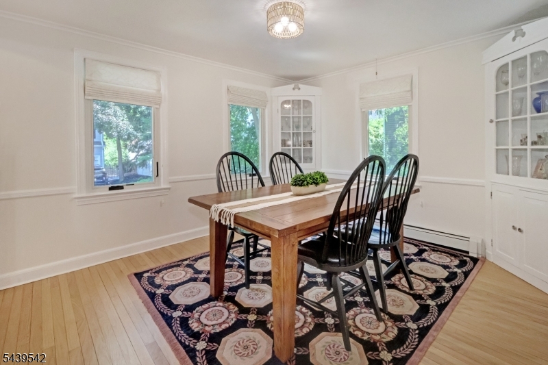 Tucked away on one of Chatham's most peaceful and convenient cul-de-sacs, this deceptively spacious Cape Cod offers the perfect blend of comfort, functionality, and value. Freshly painted throughout, the home lives much larger than it appears, with multiple living spaces designed for today's lifestyle. The main level features a formal living room, a bright and inviting sunroom, and an expansive family room that flows seamlessly from the newly painted kitchen creating plenty of room to gather, relax, and entertain. Upstairs, you'll find three bedrooms, including a generously sized primary suite complete with a private bath and large walk-in closet. The finished lower level adds even more flexibility, featuring a recreation room ideal for movie nights, gaming, or a home office, along with a spacious laundry and utility area. A one-car attached garage provides everyday convenience. Outside, a private backyard with a hardscaped patio and storage shed perfect for summer entertaining, gardening, pets, or play. Rarely does a home in such a desirable Chatham location offer this much space and value. Don't miss your opportunity to make it yours schedule your private showing today.