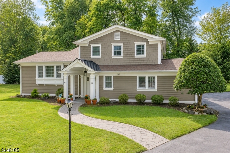 Meticulously maintained 4BR home on a 0.33-acre cul-de-sac lot, two blocks from AWR Elementary. The updated kitchen features granite countertops and new stainless-steel appliances, the dining area impresses with a 12-foot ceiling and gas fireplace, and the living room/dining rooms are bathed in natural light from three sides. All four bedrooms are upstairs, including a primary suite with full bath. The finished 2-car garage, mudroom, laundry, and powder room complete the ground floor. The basement offers an abundance of storage/flex space. Outside, a spacious patio overlooks a level yard with pool potential. Extras include a whole-house Generac generator, water softener, and humidifier. Minutes to Rt. 78, Murray Hill Train Station, and vibrant downtown fine dining and small businesses.