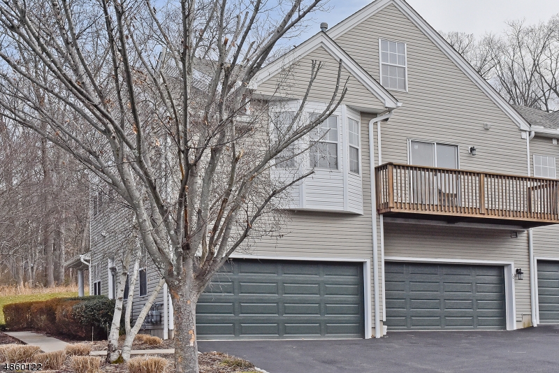 Enjoy maintenance free living all year long in the sought after Four Oaks community in Bedminster. Two bedroom two and a half bathroom end unit with a two car garage a short distance to the community tennis courts.  The bright and airy kitchen has plenty of storage and sliders to a private balcony. The homes two bedrooms offer an abundance of closet space with the master featuring a walk-in and full bath. The loft is a great bonus as it offers additional living space. All this plus a convenient location close to major highways make this home a must see.