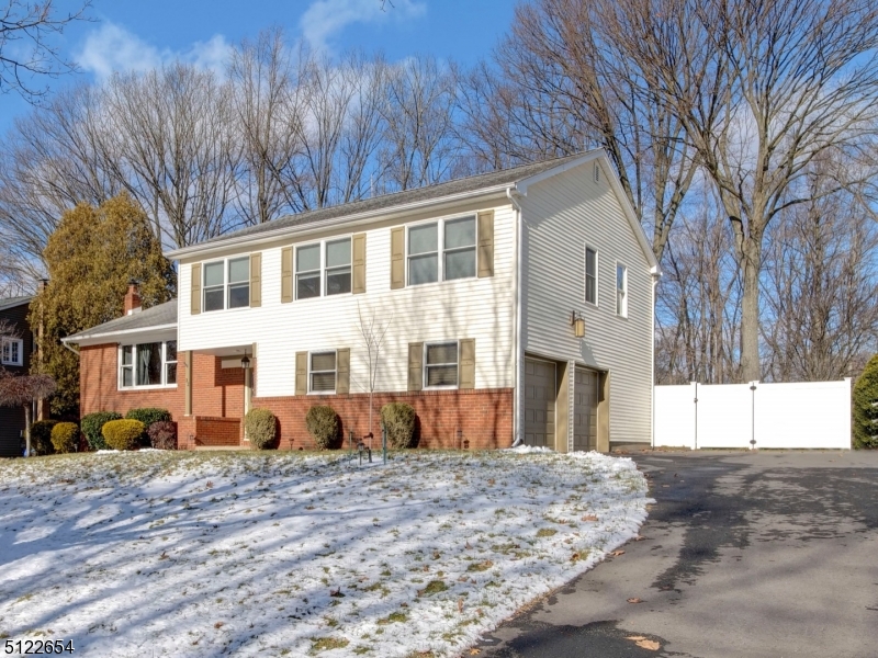 WELCOME HOME TO THIS EXCEPTIONAL, 4 BEDROOM, 2.5 BATH SPLIT-LEVEL BEAUTY LOCATED ON A QUIET, TREE LINED STREET IN SOUGHT-AFTER INTERVALE HEIGHTS. BRIGHT AND AIRY FLOOR PLAN.  FEATURES INCLUDE A LARGE LIVING ROOM WITH CATHEDRAL CEILING, FORMAL DINING ROOM WITH NEW ANDERSON SLIDERS OPENING UP TO ENTERTAINING-SIZED NEW DECK. BEAUTIFUL KITCHEN WITH GRANITE COUNTERTOPS, AQUASANA WALTER FILTRATION SYSTEM AND FULL BREAKFAST BAR. LAUNDRY ROOM WITH WASHER & DRYER. OVERSIZED, FINISHED 2 CAR GARAGE WITH EPOXY FLOORING. RELAX AT NIGHT IN THE LARGE MASTER BEDROOM WITH FULL BATH, INCLUDING TILED SHOWER STALL WITH RAIN SHOWER HEAD AND WALK IN CLOSET. 3 ADDITIONAL BEDROOMS AND FULL BATH ROUND OUT THE 2ND LEVEL. ONE BEDROOM CONVERTED INTO A HOME GYM / YOGA STUDIO. THIS HOME FEATURES  WOOD FLOORS THROUGHOUT, RECESSED LIGHTING THROUGHOUT, UPDATED ELECTRIC, NEW HOT WATER TANK (2021), NEW FURNACE (2021), NEW WATER SOFTENER (2021), BRAND NEW GAS HOOKUP (ABOVE-GROUND OIL TANK REMOVED), GAS GRILL HOOKUP AVAILABLE FOR DECK, CENTRAL AIR, NEW BLACKTOP DRIVEWAY, PARK LIKE GROUNDS, AND ALL WITHIN CLOSE PROXIMITY TO SHOPPING, SCHOOLS, MAJOR COMMUTING ROUTES MAKING THIS HOME AVAILABLE TODAY AND GONE TOMORROW.