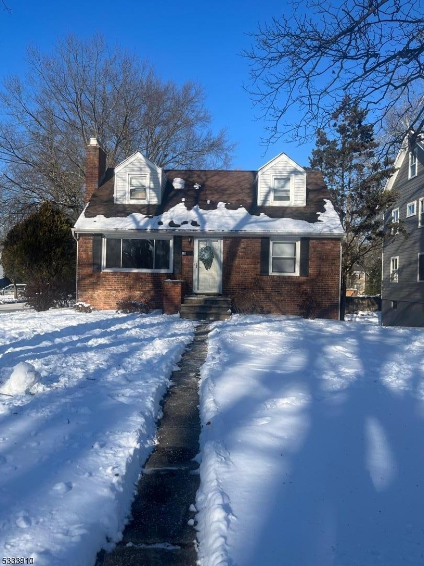 Cozy Cape Cod located on a quiet street in Chatham. Convenient to shopping, highly ranked  schools, and public transportation/ commuter routes. Features HH flooring, wood burning FP and central air. Plenty of storage with spacious basement and one car garage.