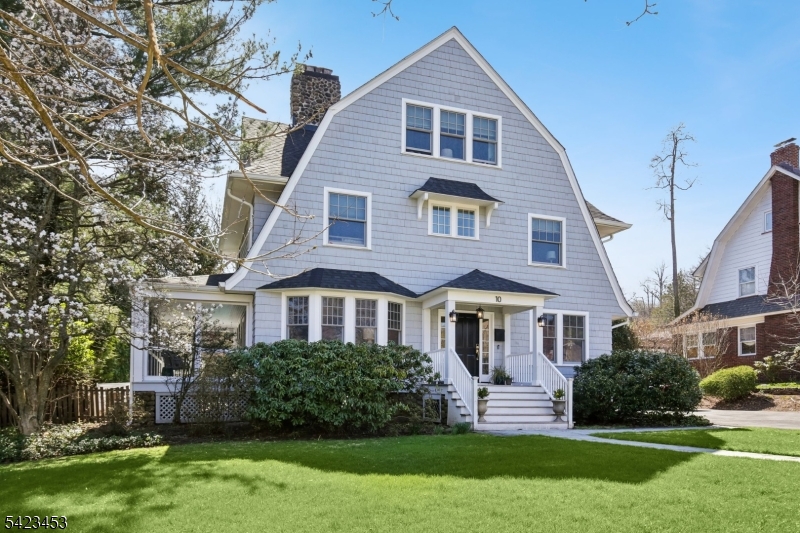 Turnkey, design-forward living with a refined modern aesthetic, ideally positioned between 157-acre Mills Reservation and Iris Mountainside Park/Iris Gardens, just a few blocks from Upper Montclair Village shopping, restaurants, fitness studios & NYC direct train/bus service. completely rebuilt and thoughtfully reimagined with updated systems and curated finishes throughout, this home blends sophisticated design with effortless everyday living. Elegant yet highly livable, the versatile main level features living & dining rooms each anchored by its own fireplace with access to a screened porch for seamless indoor-outdoor flow. The stunning chef's kitchen with center island opens to a sun-filled family room with gas fireplace and direct access to the backyard retreat, while an adjoining breakfast room/game room offers flexible space for casual dining, play or entertaining. The vaulted primary suite offers a spa-like bath with soaking tub, oversized shower, double sinks, water closet, two walk-in closets & adjacent office. Four additional bedrooms include two en-suite baths plus a hall bath with double vanity. The finished lower level features a dedicated audiophile-quality sound studio, ideal for musicians, podcasters or voice/music enthusiasts, and a gym or play space. Outdoor living rivals a private resort with a fully fenced backyard showcasing mature landscaping, expansive terraced bluestone patio with firepit, heated in-ground pool & hot tub. Not to be missed!