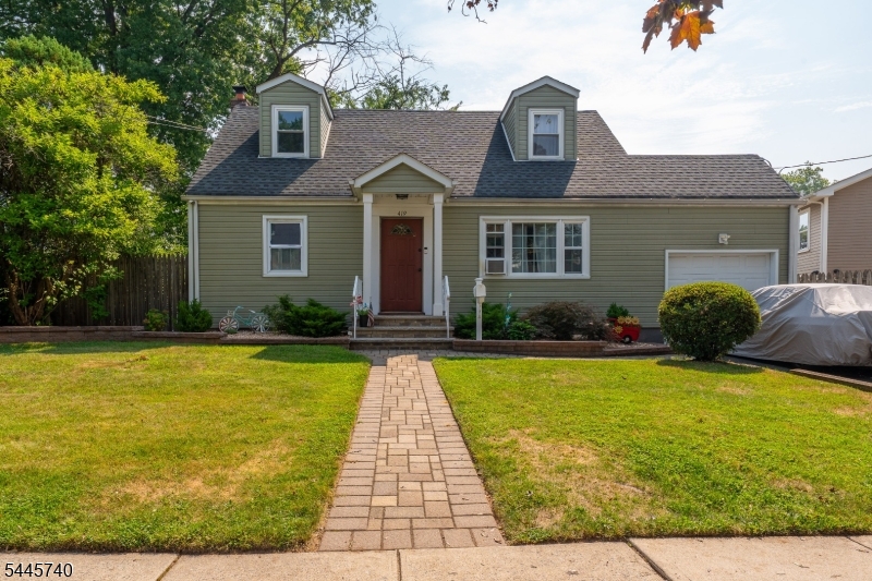 Welcome to 419 Edgewood Rd., Linden! Beautifully renovated from top to bottom, this move-in-ready 4-bedroom, 2-full-bath Cape Cod is located in the highly desirable Sunnyside section on a quiet, tree-lined street. The open-concept floor plan is perfect for everyday living and entertaining. Featuring spacious bedrooms, quality craftsmanship, detailed woodwork, and stylish finishes throughout. Enjoy professionally landscaped, park-like grounds with outstanding curb appeal. Conveniently located next to McManus Middle School and close to parks, shopping, restaurants, major highways, and public transportation. A rare opportunity to own a turnkey home in one of Linden's most sought-after neighborhoods.