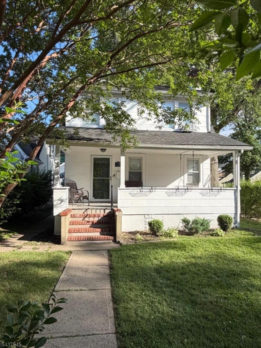 Charming 1930 Colonial full of character and timeless appeal! This well-maintained 3-bedroom, 1.5-bath home blends classic architectural details witheveryday comfort. An inviting open front porch with a porch swing welcomes you home and offers the perfect spot to relax and enjoy quiet mornings orevenings. Inside, the cozy living room features a gas fireplace, creating a warm and comfortable space for gathering and entertaining. The bright andfunctional layout offers spacious bedrooms, warm natural light, and timeless charm throughout. A full basement provides excellent storage, workspace,or potential for future finishing, while the one-car garage adds convenience and utility. With its classic curb appeal and solid construction, this homecombines the charm of a traditional Colonial with modern-day practicality.
