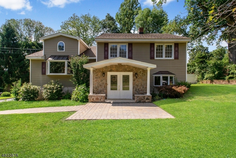 Totally renovated custom home with in-ground pool ready and waiting!  Beautifully hardwood floors, open floor plan, high ceilings, granite & stainless steel kitchen and a 1st floor master bedroom! This multi-generational home offer flexible living arrangements for so many situations.  Complete inlaw suite with 2 bedrooms, kitchen, living room, full bath & powder room with no stairs and separate entrance.  Nothing to do but move in.  3 bedrooms and 2 full baths on second floor.  Close to schools, highways, shopping & more.