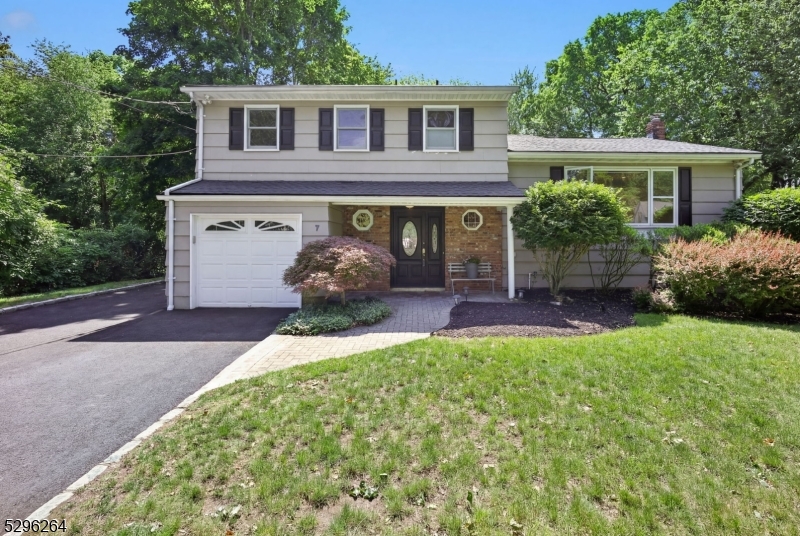 A custom renovated charming gem on a picturesque cul-de-sac featuring 4 bedrooms, 2.5 baths & finished basement is ready to welcome you. The luxury first level has a open floor plan. A fabulous chef-style kitchen awaits you! Custom cabinets w/tons of granite counter space, Custom tile backsplash & marble top bay window. Phenomenal, vaulted ceiling dining room w/large, picturesque windows & molding is Perfect for entertaining! The spacious living room with large windows holds lots of natural light. All season sunroom w/skylights & tons of windows is a wonderful place for relax. Plus, first floor has a spacious family room & a updated powder room! Upstairs, master suite features updated full bath & walk in closet. Three additional bedrooms and a Newer main bath w/double sink quartz top vanity complete this floor. Beautiful hardwood floors and recessed lights add warmth and richness to the newly painted home's interior. The finished lower level provides a big rec room, laundry room & storage space. Backyard is an outdoor lover's dream! Paver patio, underground sprinklers, backs to greens. The solar panel ( paid off), new roof ( 2026), new driveway ( 2025), new washer ( 2026) increase more value. The house is conveniently close to Schools, Transportation & Shopping and ready for moving in.