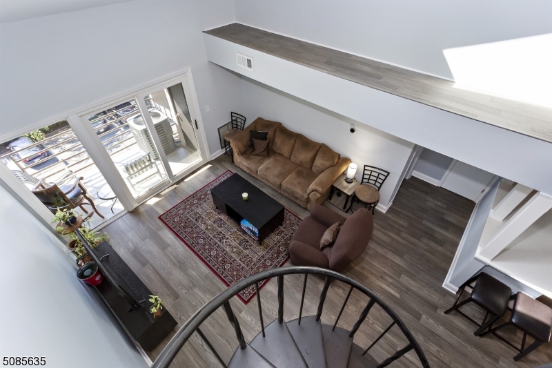 High end finishes in this end unit 2 story condo on top floor. No expense spared by the landlord to completely renovate this amazing modern condo in 2020 with vaulted ceilings, skylights & all new high end appliances, clothes washer & dryer, floors, windows, & beverage cooler.  Gorgeous Quartz counters in kitchen & a high end stove/oven.  Both baths have been completely redone with top quality tiles fixtures and finishes.  Spiral Staircase to 2nd level w/2 rooms of additional living space. New Heater & Central Air unit. Close to Town center so leave the car home and enjoy all the restaurants, theater and movies.  Also very close to Morristown's Mid Town Direct Train Line. Elevator, secure lobby & gym check off more items on your wish list!  1 assigned space 2nd space 1st come 1st served Max 2 cars per Unit  Photos taken prior to tenant moving in