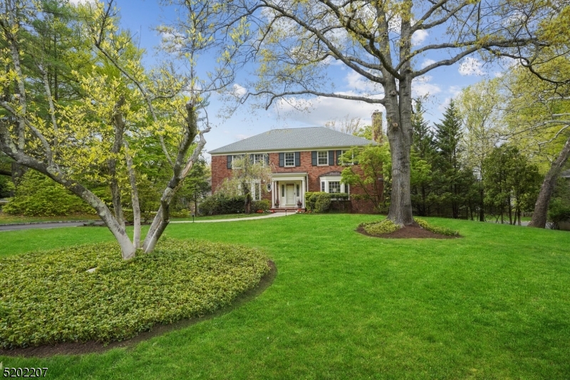 ELEGANT 5 bedroom, 3.5 bath brick colonial residence on a 0.58 acre park-like, private property. Tranquil cul-de-sac location in sought after Hartshorn school district of Short Hills. Tremendous curb appeal and a versatile open floor plan will delight even the most discerning buyer. A home ideal for entertaining with a sophisticated sun-drenched living room with custom book cases and a wood burning fireplace. The elegant dining room has large doors to the deck and serene property. Tastefully finished walk-out lower level is amazing and offers media/rec room. Convenient location in a premier neighborhood, close to schools, Gero park, golf and tennis courts, town swimming pool, Short Hills train station, major highways, Cora Hartshorn & Reeves Reed Arboretum, Greenwood Gardens, bustling downtown with fine area restaurants, grocery/gourmet food stores. Perfect home to take advantage of Millburn's top-rated schools, easy NYCcommute. Enjoy suburban living at its best!