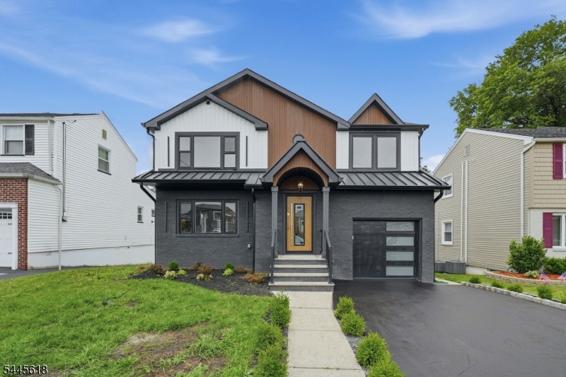 Welcome to this exceptional fully renovated residence where modern luxury meets everyday functionality. Designed with sophistication and comfort in mind, this home has been completely transformed with high-quality upgrades, including new plumbing, electrical, roof, and siding.Step inside to a beautifully designed open-concept layout featuring a stunning chef's kitchen with a quartz waterfall island, premium appliances, and a spacious living area ideal for entertaining guests. The luxurious primary suite provides a private sanctuary with a balcony, walk-in closet, and spa-inspired ensuite bathroom complete with a freestanding tub, walk-in shower, dual vanity, and private water closet.The finished basement expands the living experience with additional space for a recreation room, home office, gym, or guest suite. Hardwood flooring, an attached garage, and private driveway add convenience and style.Located in a desirable Nutley setting with easy access to the Garden State Parkway, Route 3, and Route 280, commuting to New York City is effortless. Enjoy being close to Montclair and Bloomfield's vibrant dining, shopping, and entertainment while coming home to the comfort of a beautifully crafted residence.