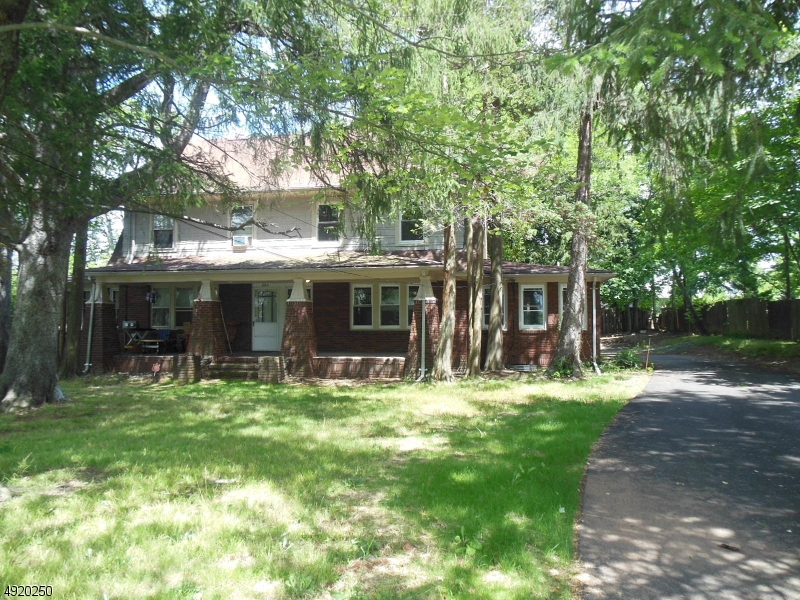 Completely renovated two-story, side-by-side duplex totaling 14 rooms with full unfinished basement, 4-car detached garage, circular driveway, and partially fenced backyard. Unit #1:  4 bedrooms and 2 full baths.  Unit #2:  4 bedrooms and 1.1 baths.  Fully upgraded kitchens with stainless appliances, newer fixtures and tiled baths, hardwood floors, newer windows, doors and new roof 2019, HVAC conversion to natural gas forced air heating and central air, separate utilities. Bridgewater-Raritan School District.  Convenient to Routes 202/206, 28, 22, 287, and 78, downtown Raritan, Somerville and Bridgewater Commons Mall.  Suitable for investment property or landlord/tenant ownership.