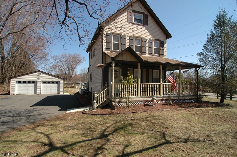 THE CHARMING WRAPAROUND PORCH INVITES YOU IN TO THIS LOVELY HISTORIC COLONIAL IN ROXBURY!  FEATURES INCLUDE: UPDATED KITCHEN WITH QUARTZ COUNTERTOPS, WOOD BURNING FIREPLACE IN LIVING ROOM, NEWER WINDOWS, ROOF IS 3 YEARS YOUNG.  UPDATED BATH AND POWDER ROOM. TRACK LIGHTING, NEWER BOILER AND HOT WATER HEATER COMPLETE THIS TERRIFIC HOME. THE OVERSIZED, 2 CAR DETACHED GARAGE ALSO FEATURES A HUGE ROOM PERFECT FOR HOME GYM OR WORK ROOM.  FULLY FINISHED WALK UP ATTIC MAY MAKE THE PERFECT 3RD BEDROOM OR HOME OFFICE.  TREX DECK IS PERFECT FOR ENTERTAINING.  FULL BASEMENT WITH LAUNDRY ROOM.  PUBLIC  UTILITIES ARE A HUGE PLUS! CONVENIENTLY LOCATED MINUTES TO RTS 80, 46, & 10, TRAIN STATION, PARK, SCHOOLS, SHOPPING AND RESTAURANTS