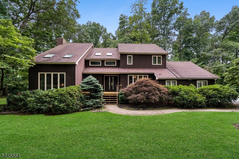 Welcome to this beautifully maintained Colonial set on 1.04 park-like acres in Randolph's desirable College Park section. This 4-bedroom, 2.5-bath home offers 9 rooms of thoughtfully updated living space. Step into the large foyer with a new front door, leading to a versatile main level featuring a living room, dining room, family room, and eat-in kitchen with center island, all-stainless appliances, under-cabinet lighting, a movable island, and abundant storage   all refreshed within the last 8 years. Enjoy your morning coffee on the awesome screened porch with retractable awning. Upstairs, the primary suite includes a full bath with soaking tub and walk-in closet, plus a second updated bedroom, both refreshed within the last 6 years. Hardwood floors run beneath flooring throughout, complemented by a whole-house intercom and central vacuum system with new motor. The finished basement adds a rec room, utility room, and workshop over a brand-new basement floor. Additional highlights include a new water heater, water pump and filter, energy-efficient doors, and an oversized 2-car built-in garage. A rare combination of privacy, space, and move-in-ready updates in one of Randolph's most sought-after neighborhoods.