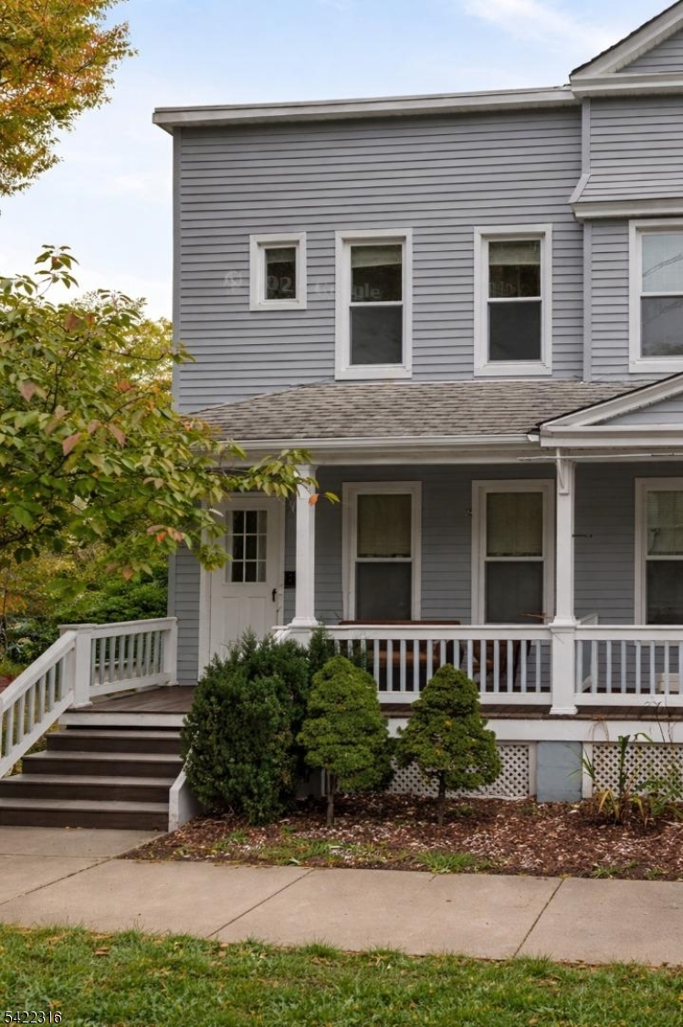Discover the perfect blend of privacy and convenience in this meticulously maintained end-unit townhouse. Located in a prime Morristown neighborhood, this home offers quiet living just minutes from the Green and the Midtown Direct train.The main level features an inviting entry that opens into a spacious living room and formal dining area. The layout flows directly into a fully renovated kitchen, updated with modern finishes. Outside, the classic "lemonade porch" provides a space for outdoor relaxation.The second floor consists of two bright bedrooms and a full bathroom. For those looking to build equity, the full walk-out basement offers extensive storage or the potential to be finished into a home office, gym, or recreation room.