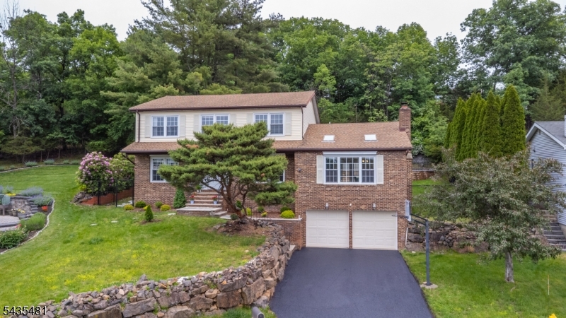 This Well Maintained Colonial sits on a quiet cul-de-sac with large rooms through-out. Spacious eat-in kitchen with island, 6 burner Viking Stove & plenty of cabinet space. Dining area leads to a backyard, great for entertaining with deck, paver block patio and an above the ground pool. Cathedral ceilings in family room along with formal living room, formal dining room and office/den. Recently updated primary bath & custom finished walk in closet. Full finished basement with large storage room. Whole House Water Pruification System, nicely landscaped, close to shopping, NY, NJ Transit & Houses of Worship